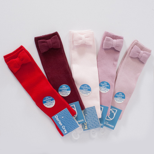 Calcetín alto con lazo del mismo tejido.DORIAN 3116-3